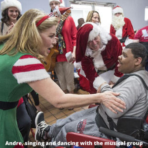 Andre singing and dancing with the musical group